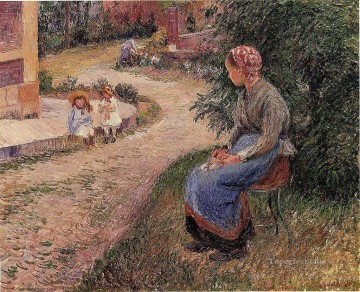 Un sirviente sentado en el jardín de Eragny 1884 Camille Pissarro Pinturas al óleo